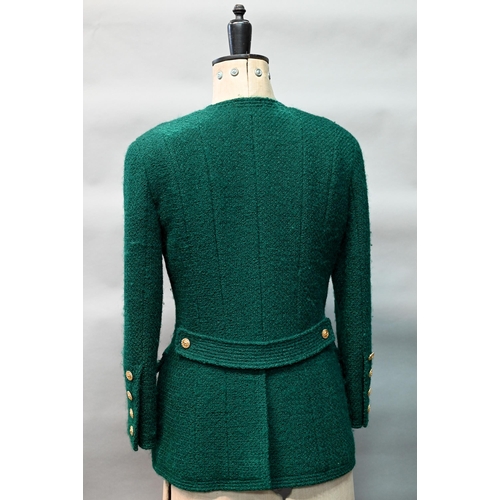 1280 - Chanel Boutique - A green wool jacket, double-breasted and fitted with six rows of double gilt-metal... 