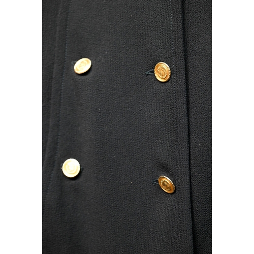 1281 - Chanel - A navy crepe dress, with long sleeves, stand-up collar and six rows of gilt metal buttons, ... 