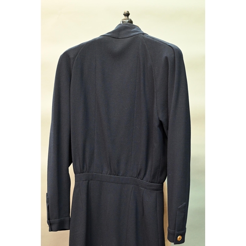 1281 - Chanel - A navy crepe dress, with long sleeves, stand-up collar and six rows of gilt metal buttons, ... 