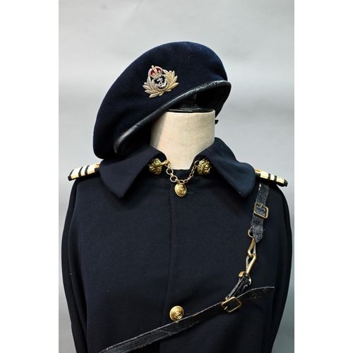 1289 - A Royal Navy boat cloak, beret and sword belt with King's crown on belt and  Lt Cdr epaulettes, by G... 