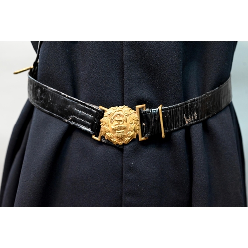 1289 - A Royal Navy boat cloak, beret and sword belt with King's crown on belt and  Lt Cdr epaulettes, by G... 