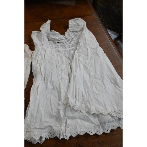 1296 - Approx five antique baby robes, with lace trimmings c/w bonnets