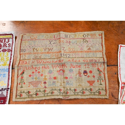 1297 - Two boxes of mixed textiles including table linens, two chintz patchwork coverlets, etc