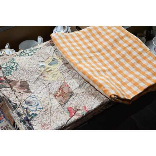 1297 - Two boxes of mixed textiles including table linens, two chintz patchwork coverlets, etc