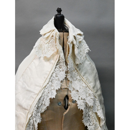 1298 - An early 20th century lined Christening robe, with lace and silk edgings 