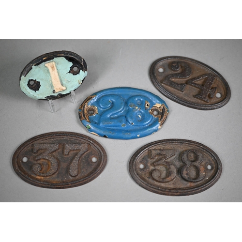 1195 - Five cast iron oval number plates, 9.5 x 6 cm