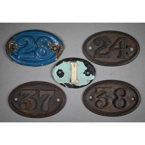 1195 - Five cast iron oval number plates, 9.5 x 6 cm