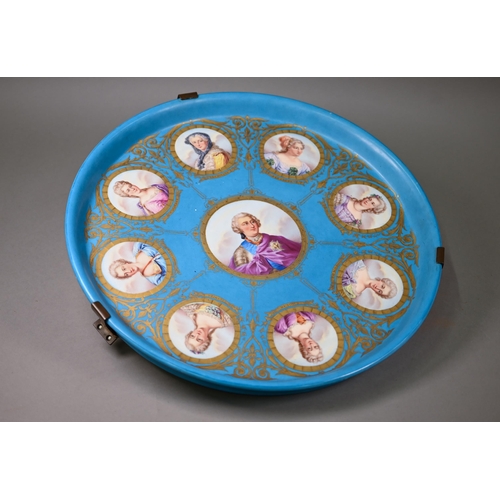 617 - A 19th century Sèvres porcelain large circular tray, painted with a portrait of Louis XV, encircled ... 