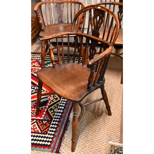 931 - Four 19th century well-matched harlequin yew and elm low splat-back Windsor armchairs with crinoline... 