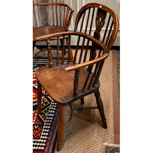 931 - Four 19th century well-matched harlequin yew and elm low splat-back Windsor armchairs with crinoline... 