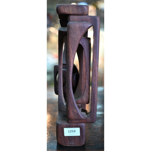 1259 - Brian Wilshire, abstract wood sculpture, carved from a single block, 34 cm high