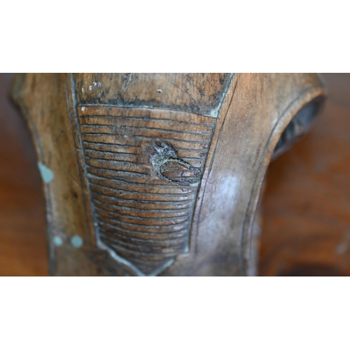 977 - A pair of 19th century Continental carved wood furniture brackets, worked with lions, 33 cm high