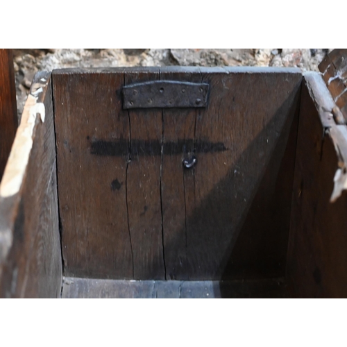 939 - A 17th century oak six plank coffer, with iron staple lock and key, the relief carved front centred ... 