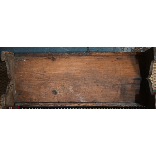 939 - A 17th century oak six plank coffer, with iron staple lock and key, the relief carved front centred ... 