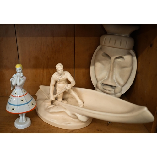 362 - A Bechyne School pottery figure of a kayakist (1950s) 21 x 50 cm to/w a ceramic wall-mask (possible ... 