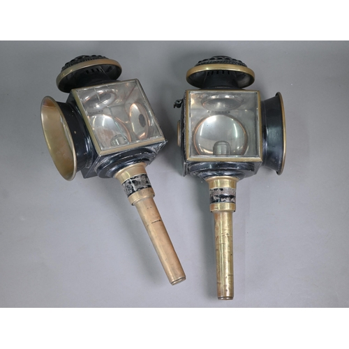 487 - A pair of antique copper and tin coach lamps with candle fittings, by Heath & Sons of Farnham, 4... 