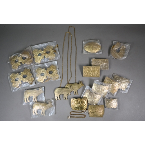 355 - A collection of twenty Indian cast brass buckles, some in the form of standing rams, some with chase... 