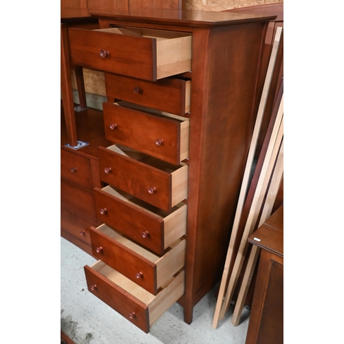 163 - A 'Baronet' Canadian maple bedroom suite with walnut stain finish comprising six drawer low chest, 1... 