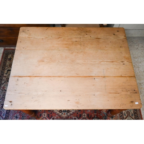 165 - A vintage pine kitchen table on turned legs, 114 x 88 x 74 cm high