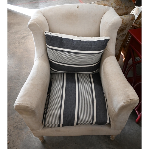 102 - A pair of calico wing-back armchairs (for re-upholstery) with blue and white striped fabric seat cus... 