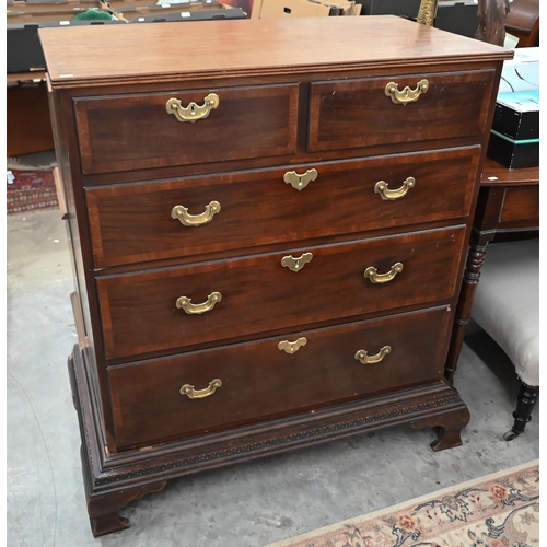 106 - A 19th century mahogany chest of two short over three long graduating drawers with brass handles, st... 