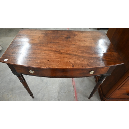 119 - A mid 19th century mahogany bowfront hall table with single frieze drawer on turned supports, 92 x 5... 