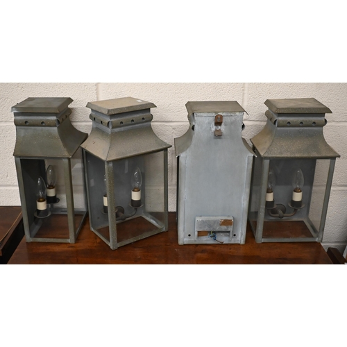 120 - A set of four Hector Finch aged metal glazed twin sconce wall lanterns 22 cm w x 16 cm d x 41 cm h