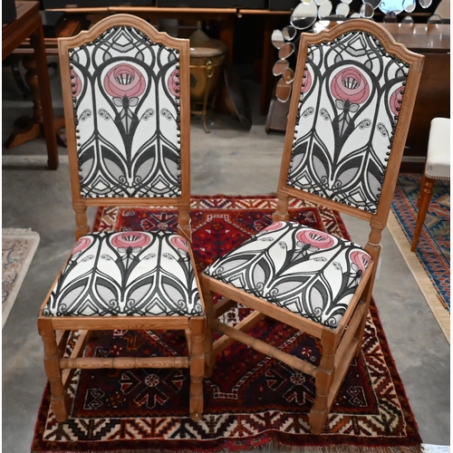 123 - Eight continental pine dining chairs with Art Nouveau style fabric upholstery