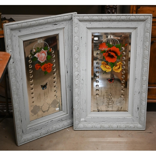 127 - A pair of antique bevelled mirrors, etched and painted with flowers and butterflies with distressed ... 