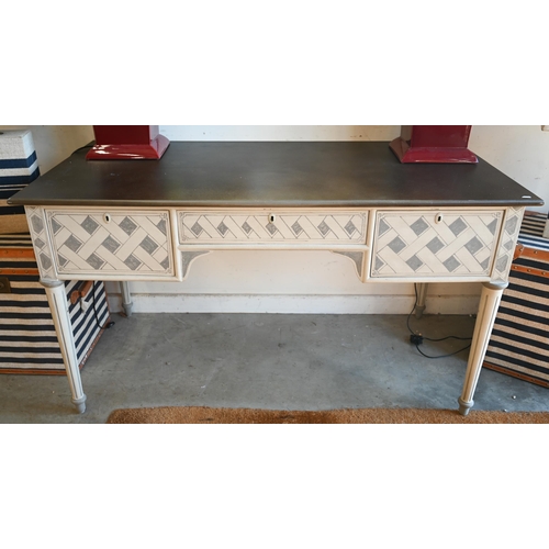 An Oka Cosimo two-tone grey painted writing table with three drawers on turned fluted supports c/w two keys, 140 x 70 x 76 cm