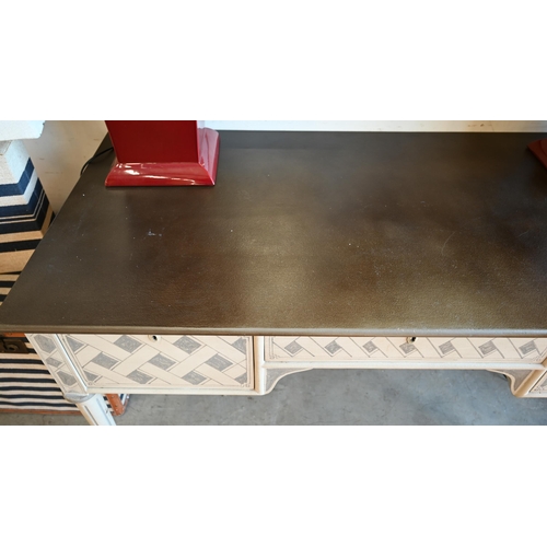 137 - An Oka Cosimo two-tone grey painted writing table with three drawers on turned fluted supports c/w t... 