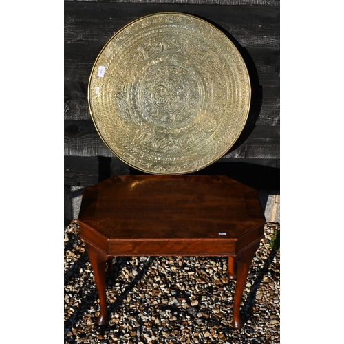 140 - An Eastern Islamic embossed brass tray top table to/w small oak coffee table (2)