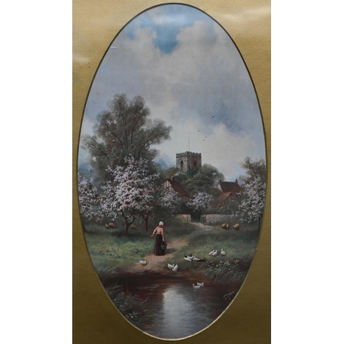 148 - A gilt-framed mirror with oval landscapes to each side of the bevelled glass, 120 x 65 cm