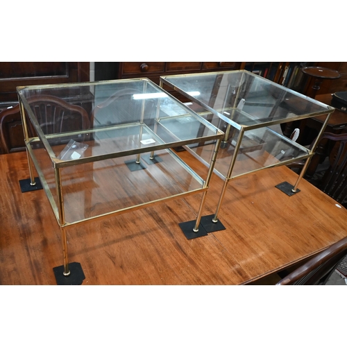 149 - A pair of vintage brass framed two-tier lamp tables with glass shelves, 50 x 50 x 40 cm high
