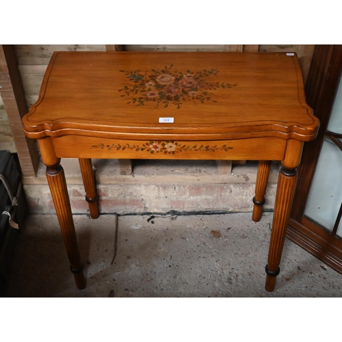 153 - A Continental serpentine tea table with folding top on turned reeded supports with polychrome painte... 