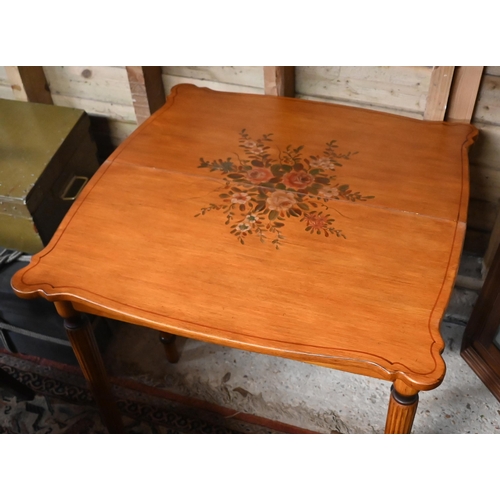 153 - A Continental serpentine tea table with folding top on turned reeded supports with polychrome painte... 