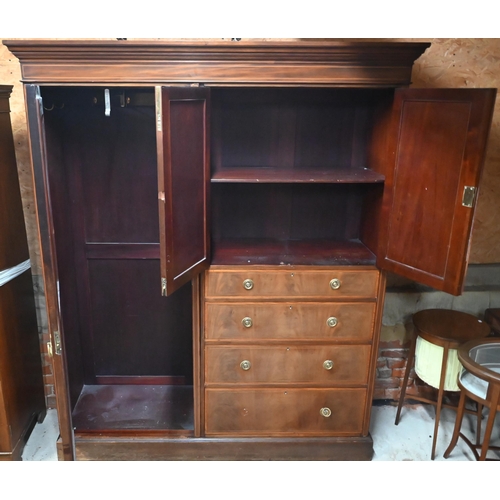 159 - An Edwardian combination wardrobe with mirrored door, smaller cupboard doors and four drawers on pli... 