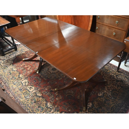 166 - # A mahogany extending twin pedestal dining table, 180 x 106 x 76 cm high