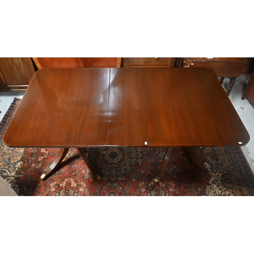 166 - # A mahogany extending twin pedestal dining table, 180 x 106 x 76 cm high