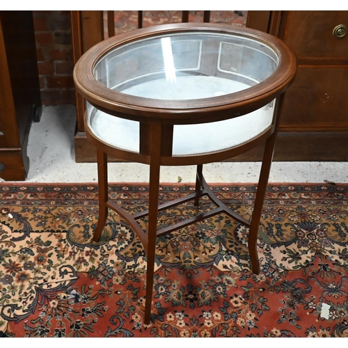 169 - An oval satin walnut glazed vitrine table, 60 cm wide x 45 cm deep x 72 cm high