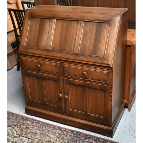 172 - # An Ercol (?) elm fall front bureau with two drawers and panelled cupboards, 94 cm wide x 46 cm dee... 