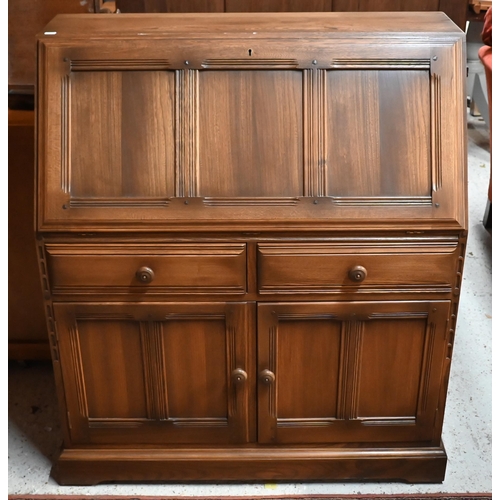 172 - # An Ercol (?) elm fall front bureau with two drawers and panelled cupboards, 94 cm wide x 46 cm dee... 