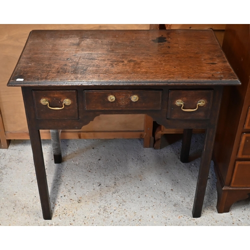 177 - An 18th century oak 3 drawer side table, raised on square section inner chamfered legs, 82 cm x 47 c... 