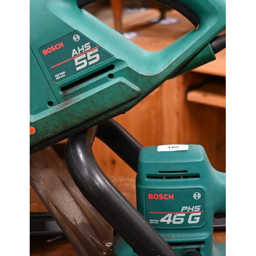 189 - Three small used Bosch electric hedge trimmers, two mains power, one battery c/withy charger and ext... 