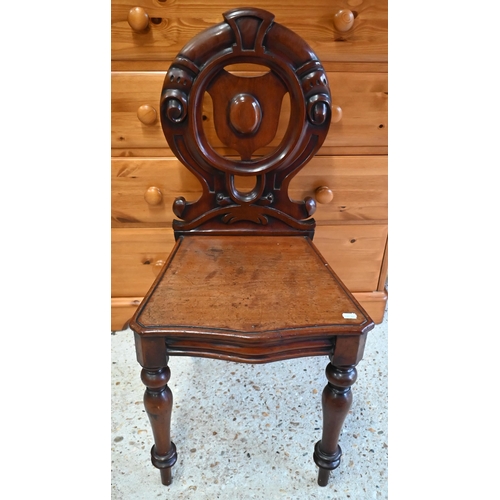 214 - A Victorian mahogany moulded back hall chair