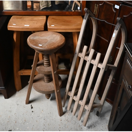 227 - A pair of beech high stools to/w an adjustable seat potters stool and vintage wooden sledge (4)