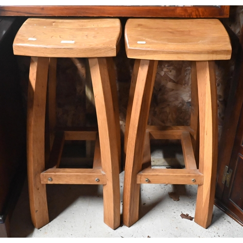 227 - A pair of beech high stools to/w an adjustable seat potters stool and vintage wooden sledge (4)