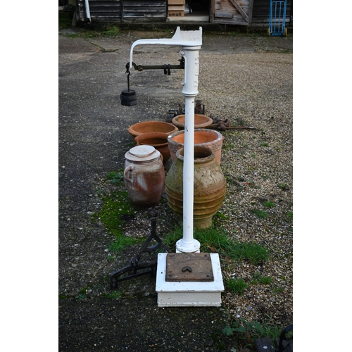 318 - # Pooley & Son, Liverpool, a vintage cast iron pillar platform scale, painted white and a/f