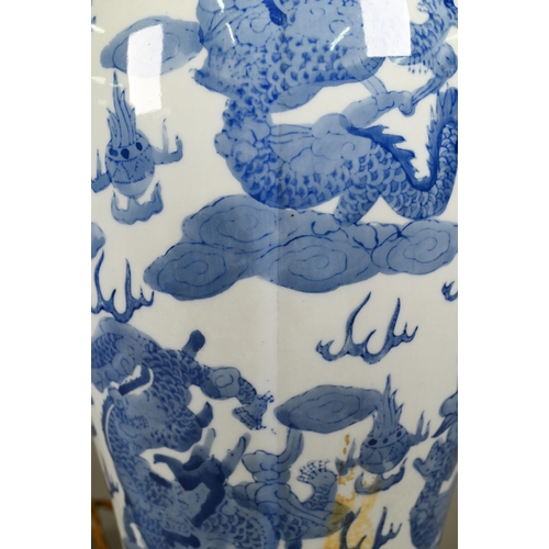 346 - A Chinese blue and white baluster vase mounted as a table lamp 58 cm high overall, to/w metal wall l... 