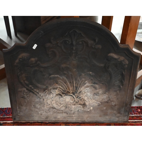 349 - # A cast iron fire back, 55 x 90 cm to/w a fire basket and girandoles, wrought iron firescreen and f... 